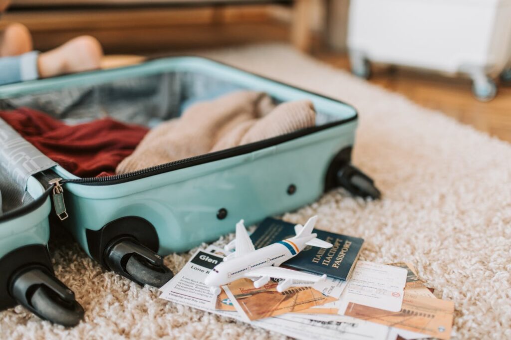 Almost empty suitcase ready to pack
