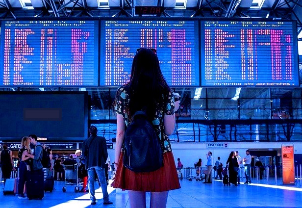 Solo woman traveler waiting in airport