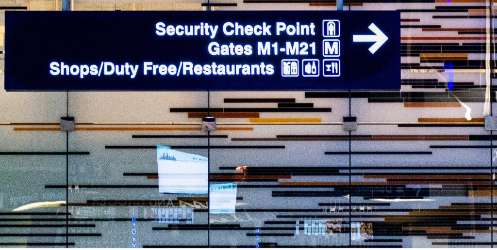 airport sign of security check point